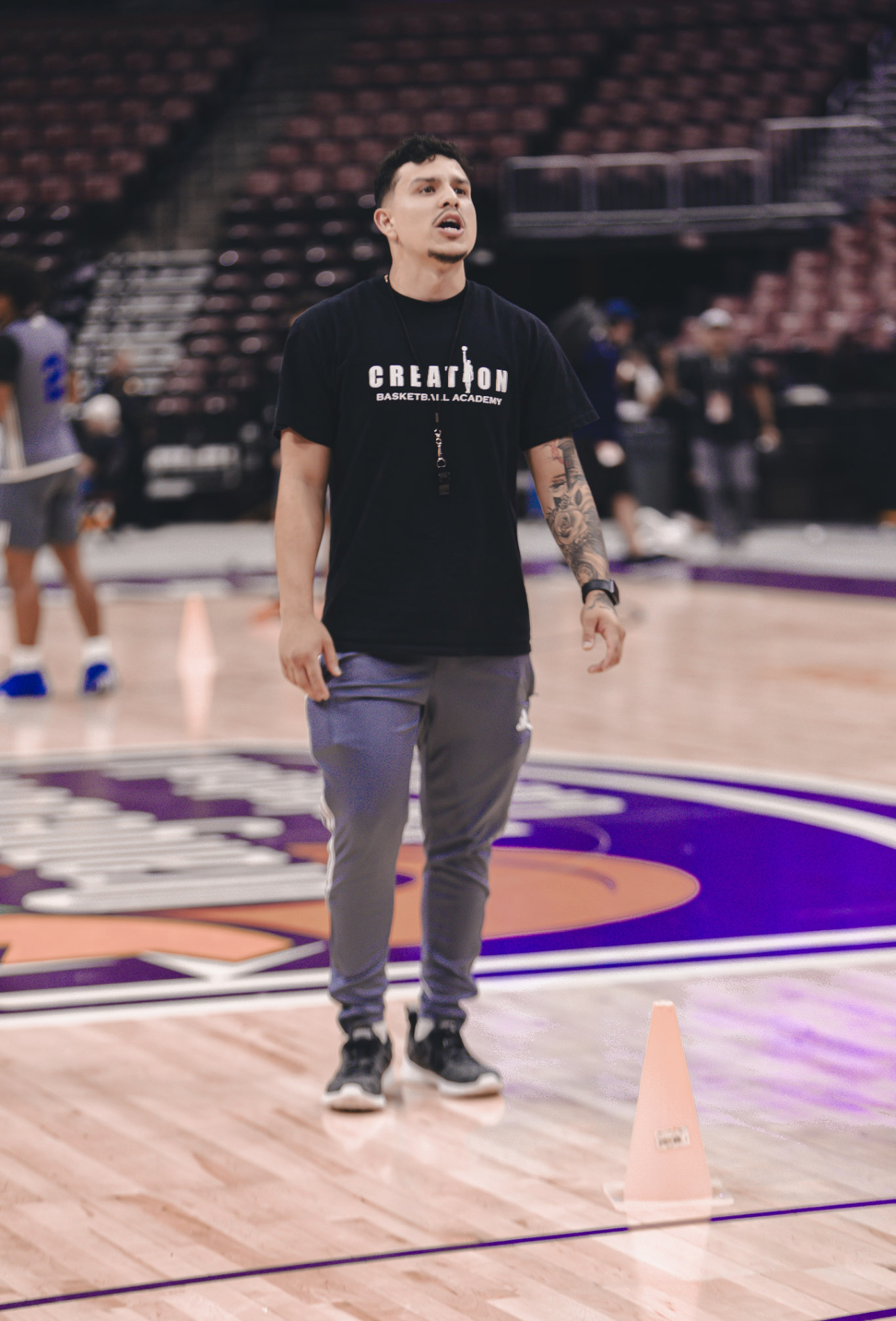 Coach Mendoza coaching at Orange Bowl