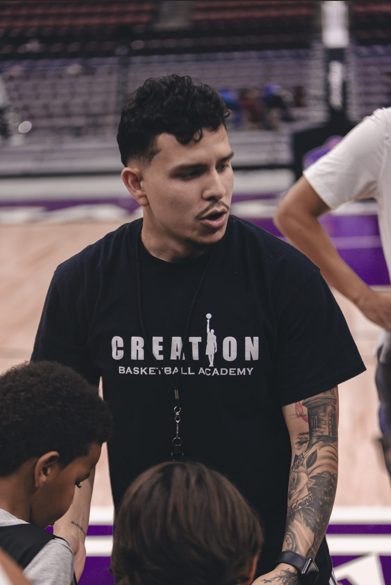 Coach Mendoza coaching at Orange Bowl